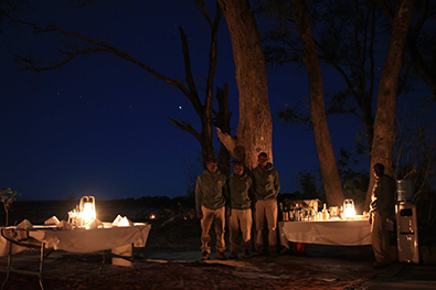 Dinner under stars and staff - Kutali Camp - Lower Zambezi National Park, Zambia