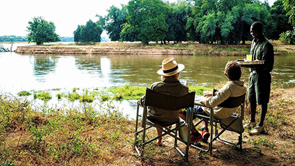 Easy time by the water - Mana River Camp